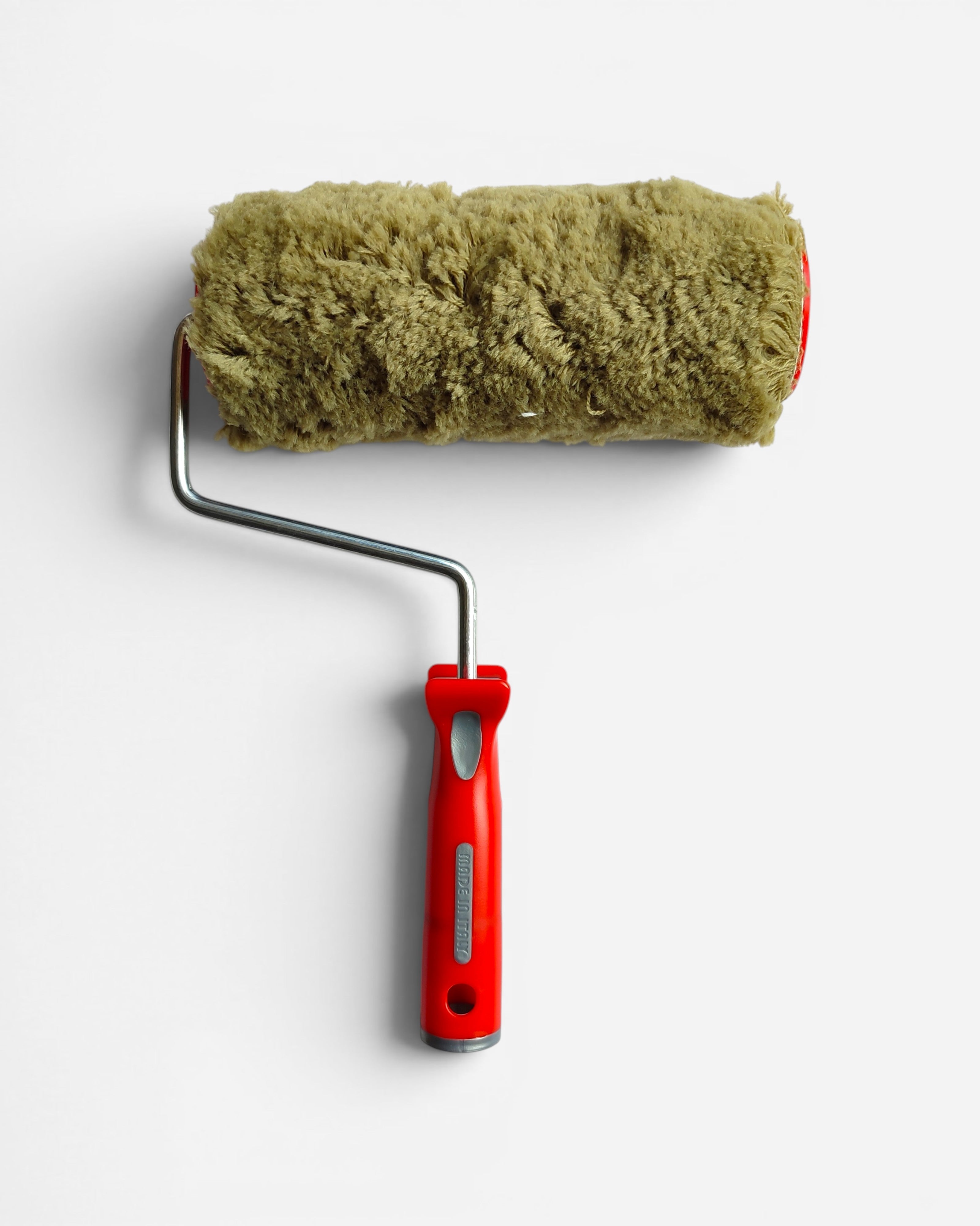 Astrofat 20cm green nylon paint roller with a red handle and plush fibers for smooth and rough surfaces.