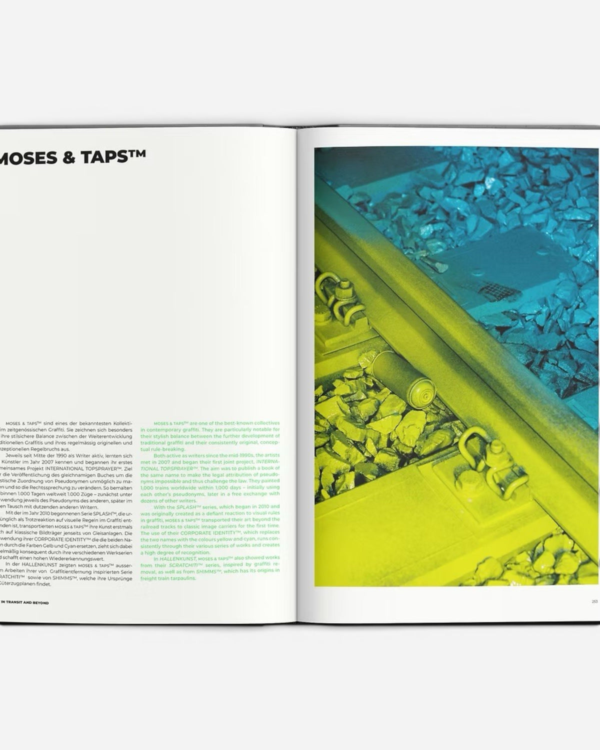 Astrofat Art In Transit And Beyond Hallenkunst book open to a page with text and a close-up of train tracks painted yellow and blue.