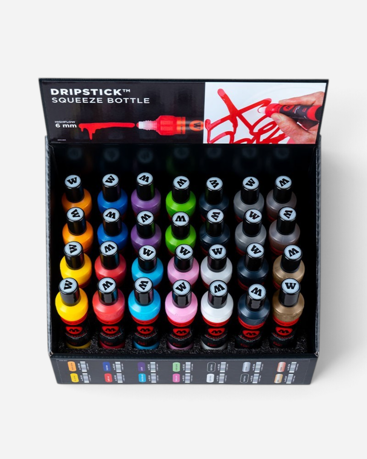 Astrofat sales display box filled with 36 colourful Molotow Dripstick squeeze bottle markers in various vibrant shades.