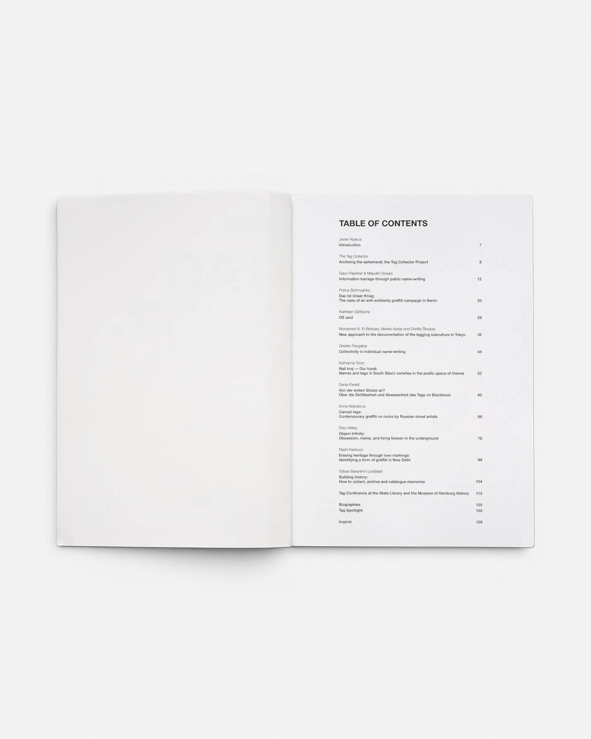 Astrofat TAG Name writing in public space book open to the table of contents page with black text on white paper.