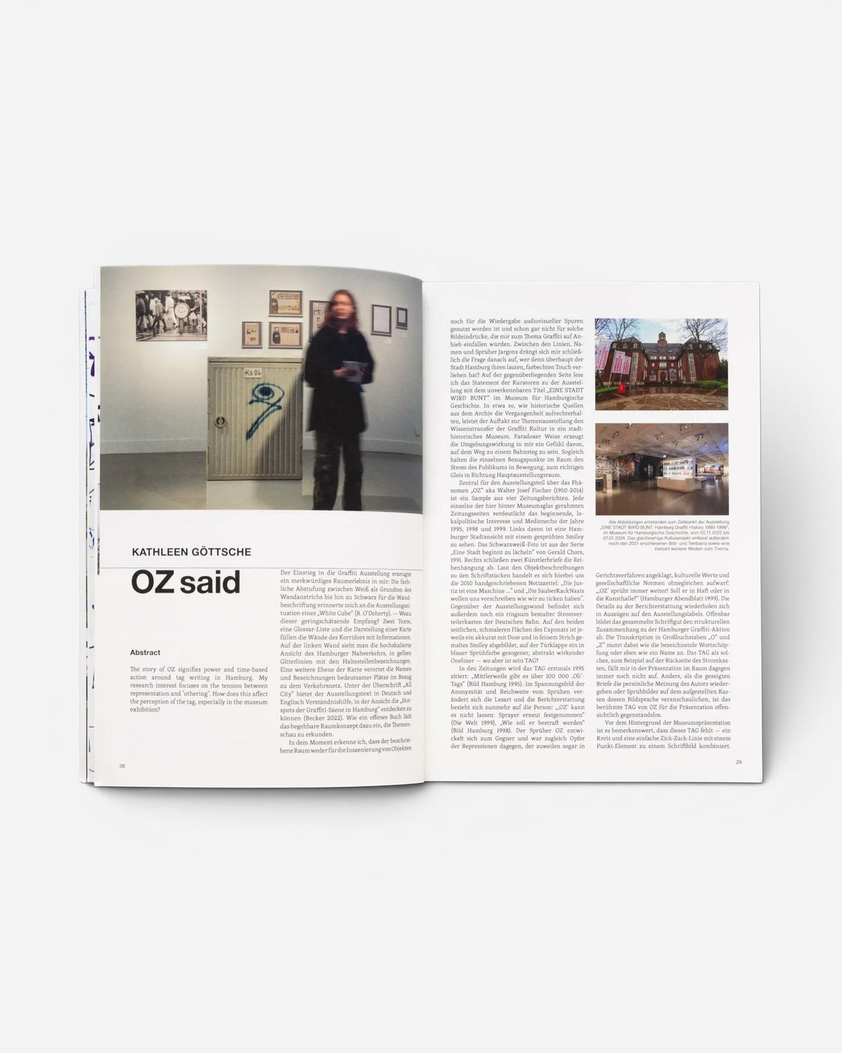 Astrofat TAG Name writing in public space book open to pages 28 and 29 featuring text and exhibition photography