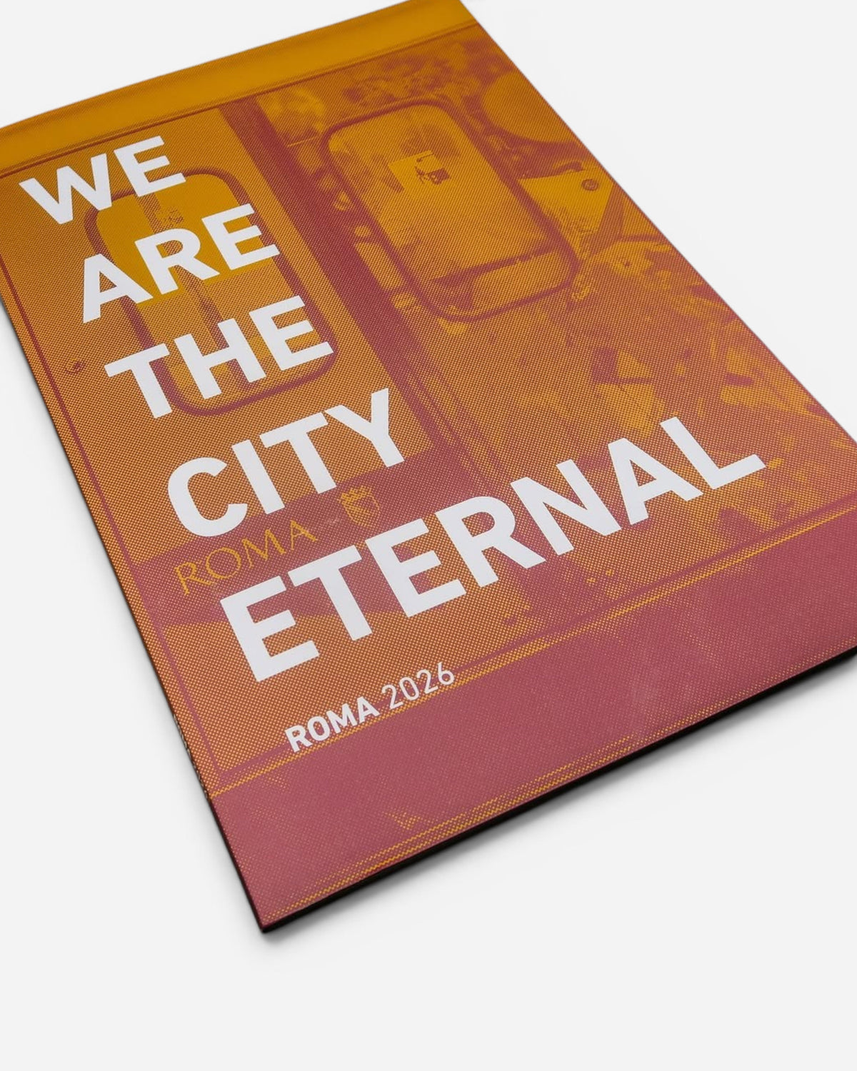 Astrofat We Are The City Eternal Roma 2026 softcover book with a yellow and red graphic cover design.